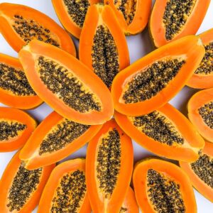 Pods of split papaya fruit