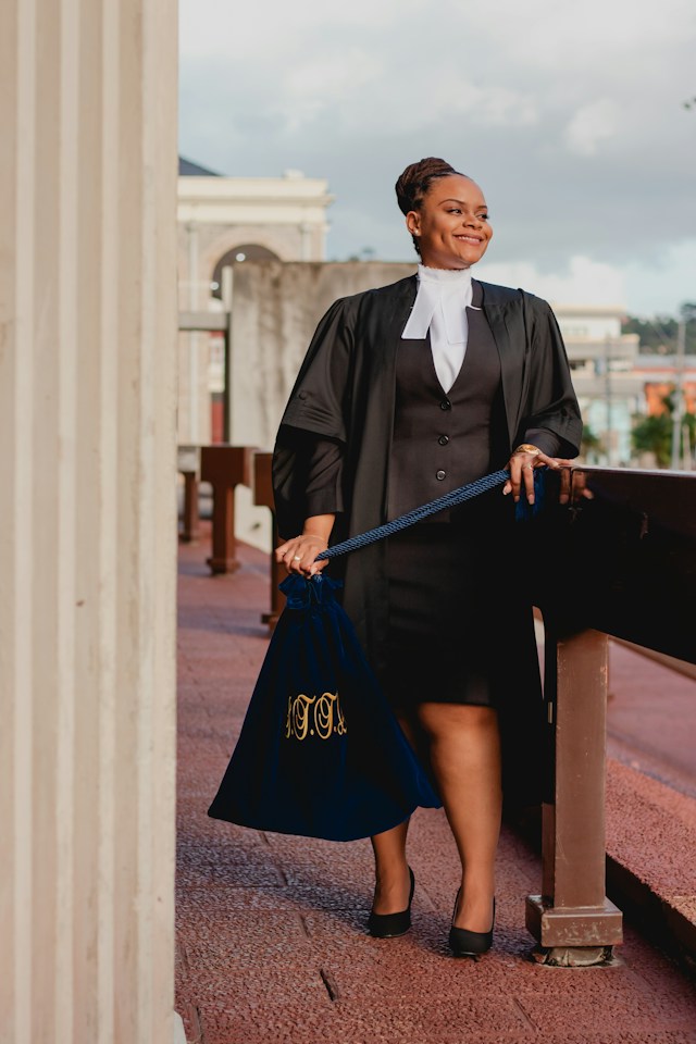 A black lawyer poses for a photograph